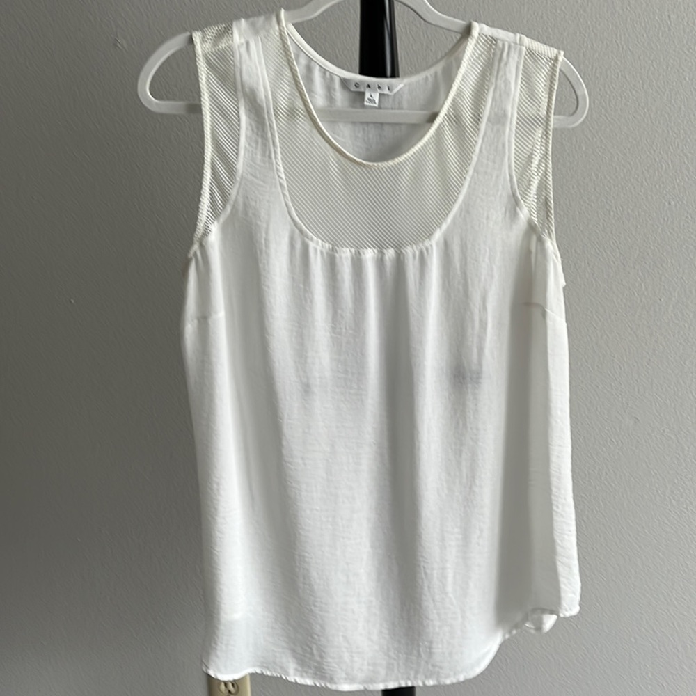 White sleeveless blouse